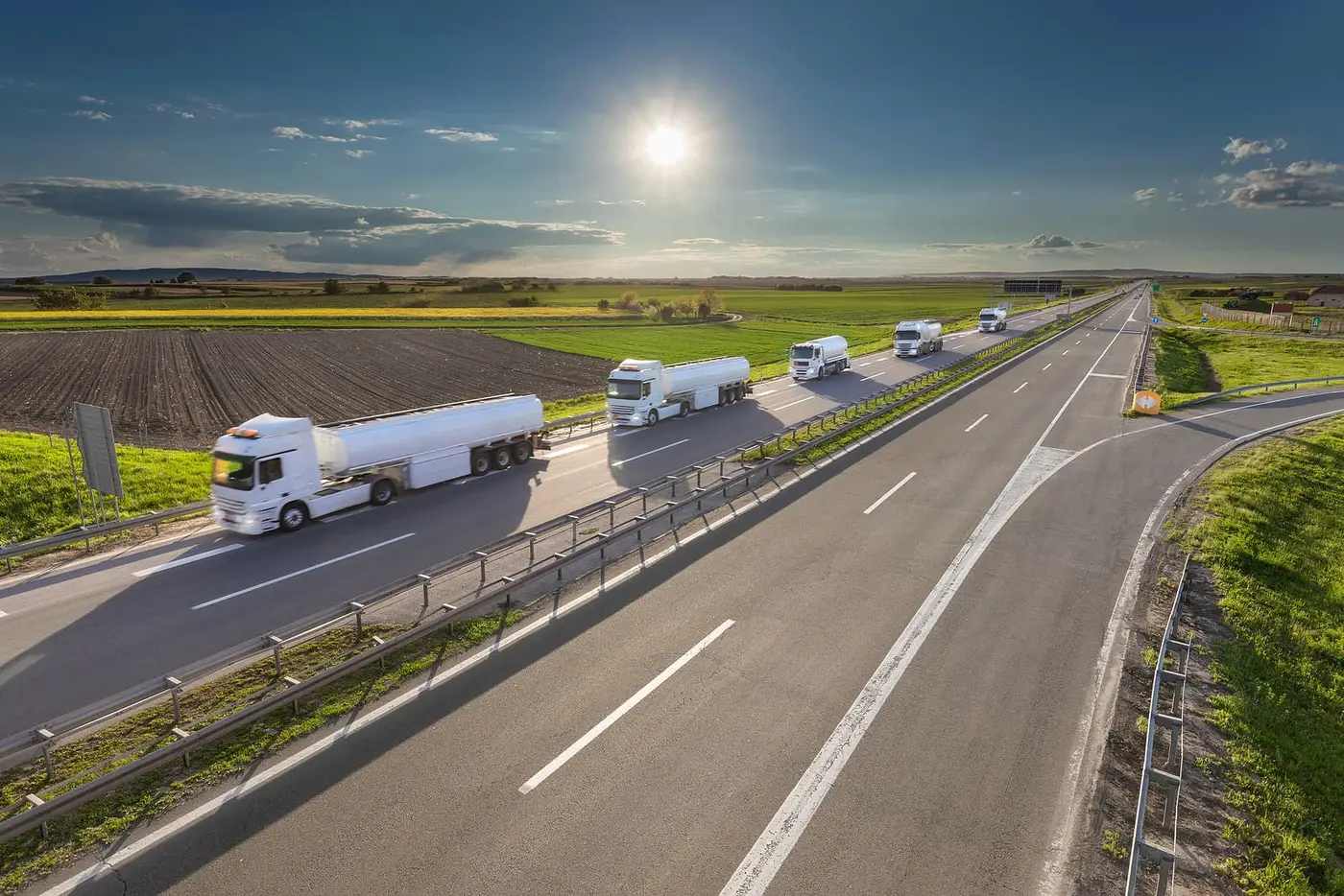 Convoy of fuel tankers on a highway