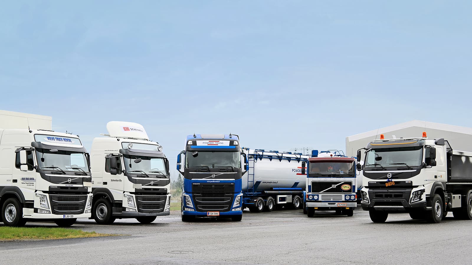 Commercial trucks parked at a fleet yard ready for overnight fueling